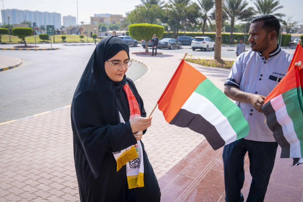جامعة عجمان تحتفل بيوم العلم الإماراتي
