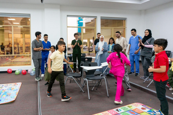 Student Clubs Celebrate International Happiness Day with Orphaned Children