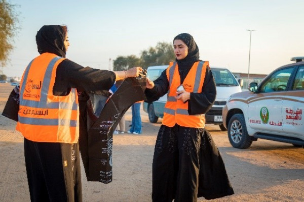 Ajman University female residents Volunteer in “Clean the Land” to support environmental sustainability. _1