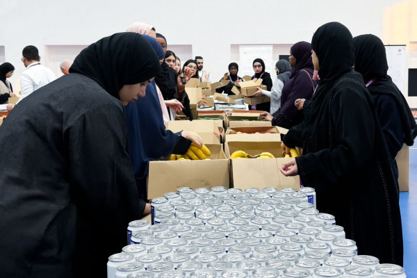 Together We Serve: Empowering Students Through Community Meal Packing _3