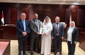 تعزيز التعاون القانوني بين كلية القانون بجامعة عجمان ومحاكم مركز دبي المالي العالمي
