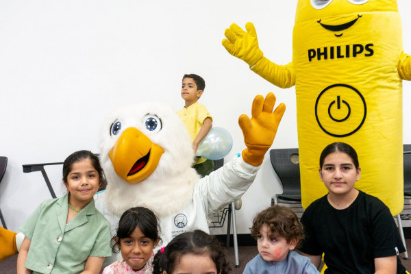 Student Clubs Celebrate International Happiness Day with Orphaned Children