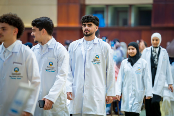 Students of the College of Pharmacy and Health Sciences Prepare to Begin Their Professional Journey at the White Coat Ceremony