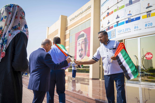 جامعة عجمان تحتفل بيوم العلم الإماراتي