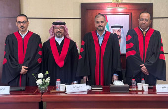 الطالب أيمن أحمد الشميلي يناقش أطروحته للماجستير حول النظام القانوني لمعالجة البيانات الشخصية عبر الحدود