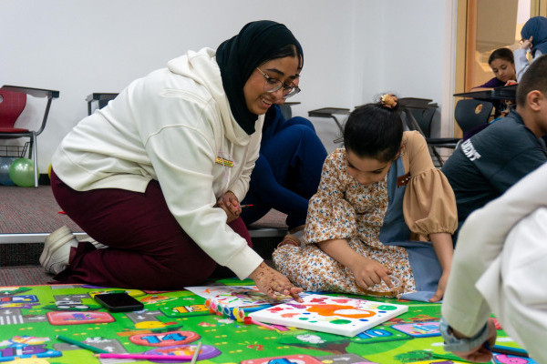 Student Clubs Celebrate International Happiness Day with Orphaned Children