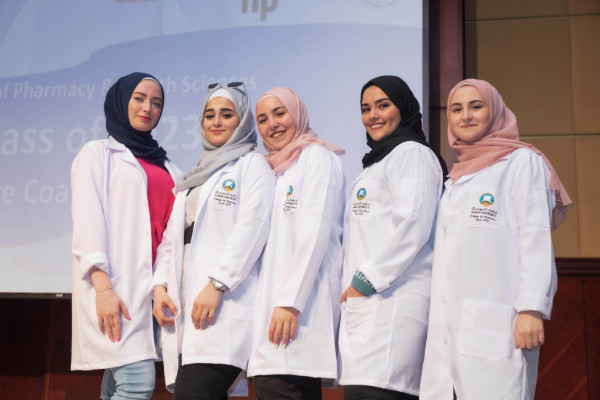 College of Pharmacy and Health Sciences receives its new students with white coats