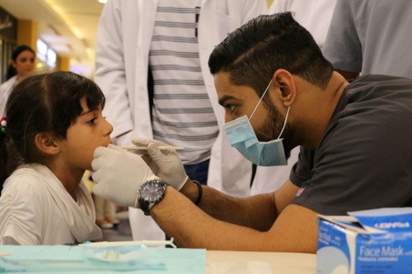 Students Hold Oral Health Awareness Campaign at Mall