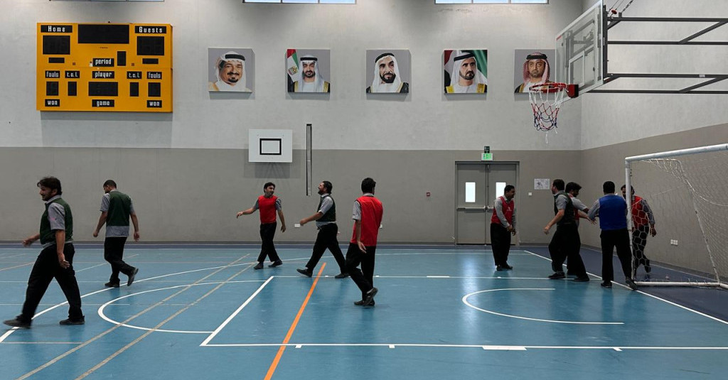 Ajman University’s Athletics Unit Organizes Futsal Tournament for Bus Drivers